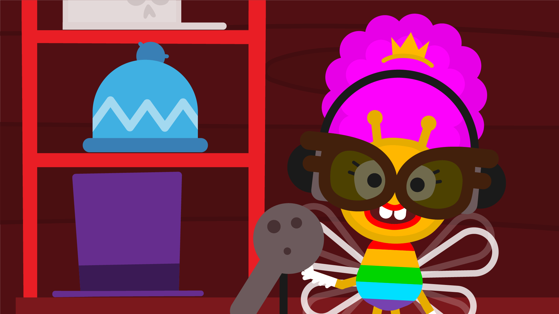 Queenie Bee Monster at a microphone